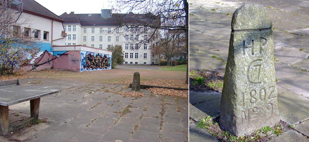 Grenzstein No 9 auf dem Schulhof in der Christian-Förster-Straße